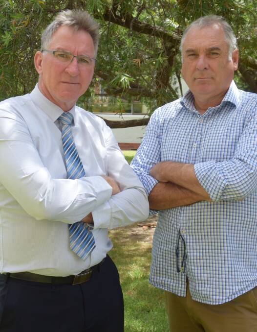 GLOVES COME OFF: Albury mayor Kevin Mack, left, and Cr Murray King are upset the Riverina Highway upgrade won't be completed until mid-way through next year.