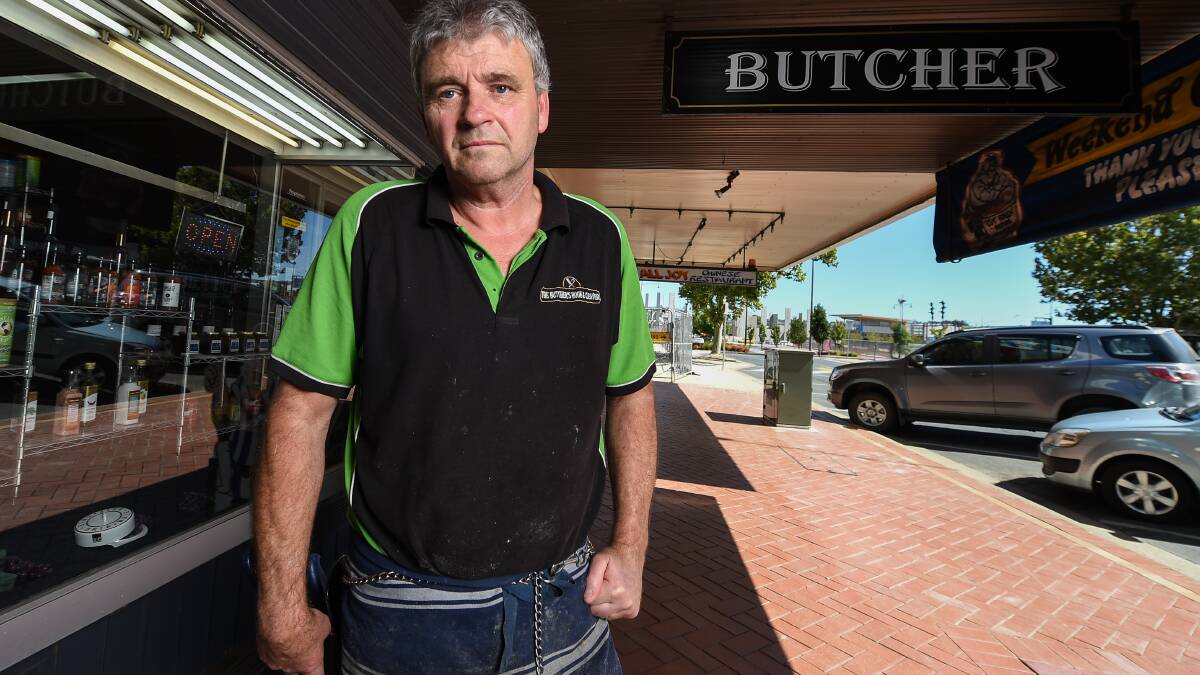 High Street butcher Rex McKay previously had car parks out the front of his shop.
