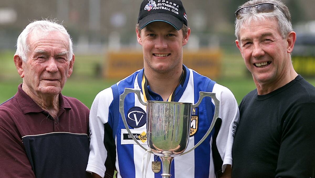 Three generations of Chisnalls have been involved with Corowa-Rutherglen, Bill, Guy and Peter. They are pictured after the 2003 premiership win.
