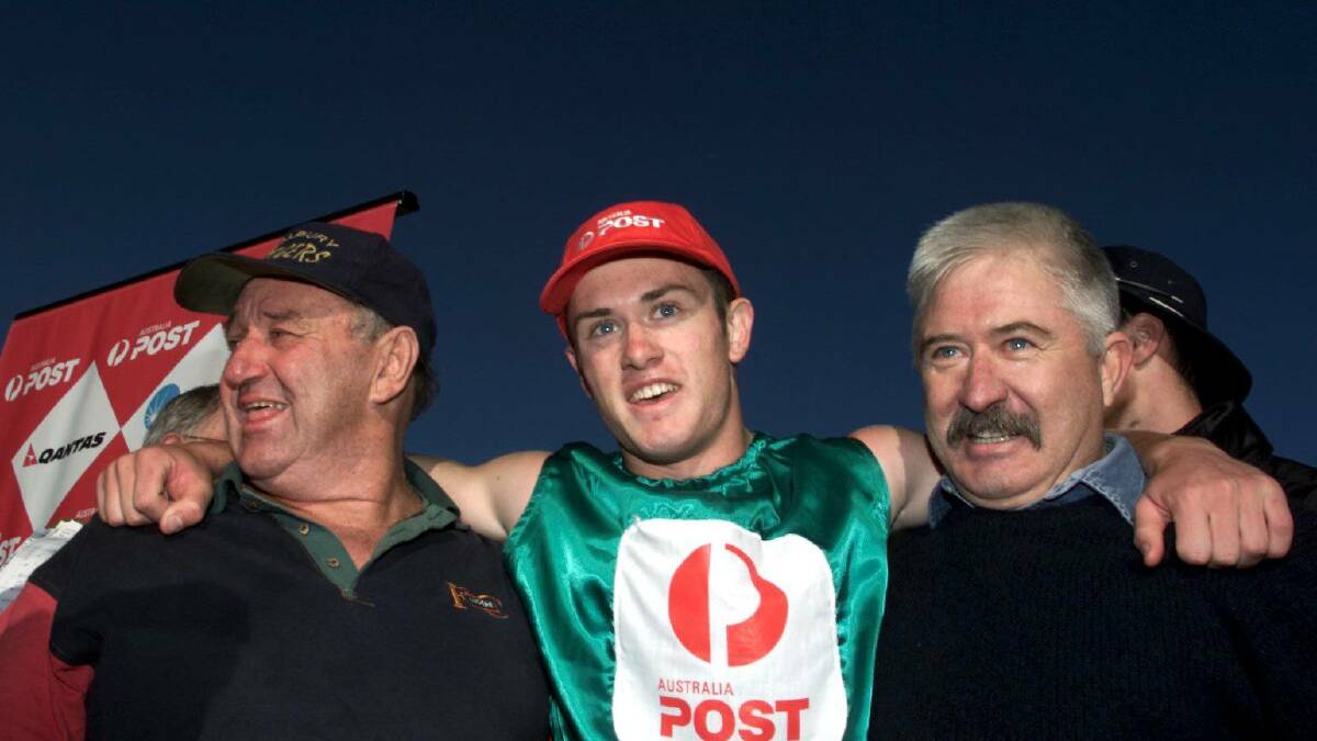 Ray Thomas, left, with 2000 Stawell Gift winner Jarrem Pearce and his dad Ian.