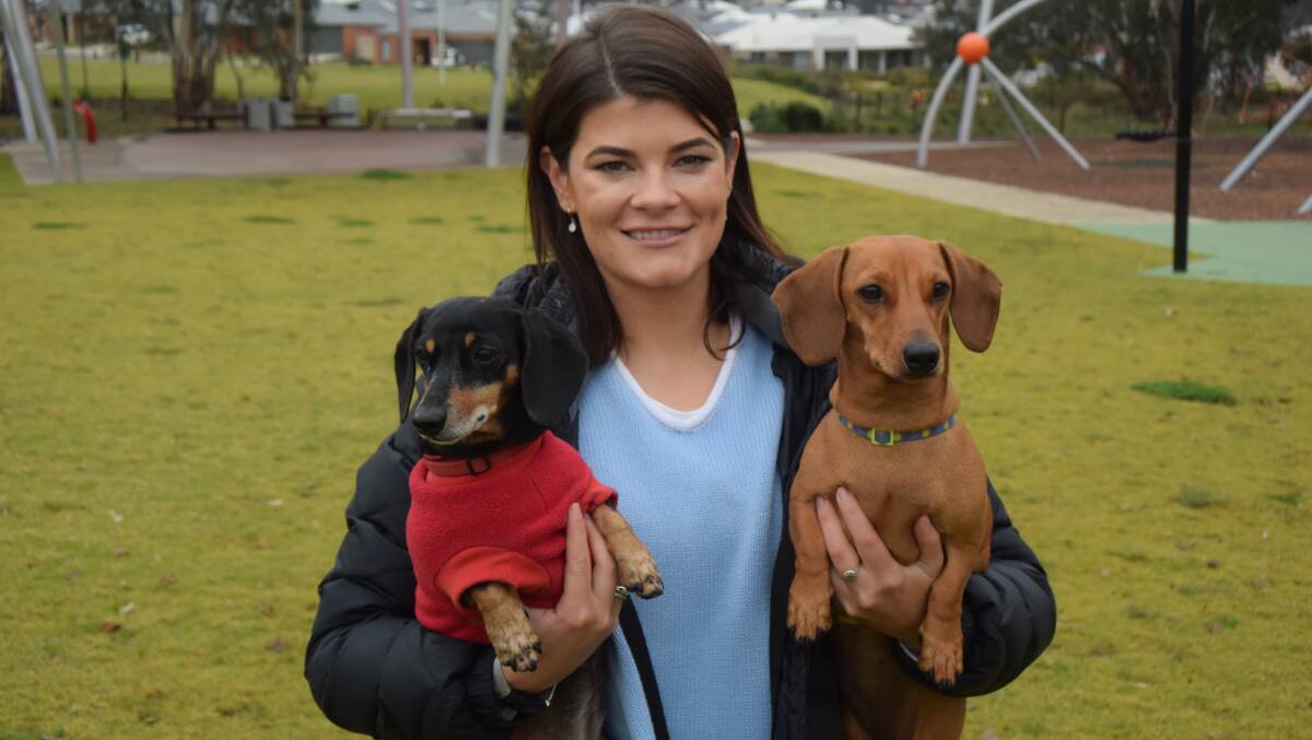 UNDER CONTROL: Cr Kat Bennett has a firm grip on her two pet dogs, Pappi, left, and Scout. But complaints about disobedient dogs have risen during coronavirus period.