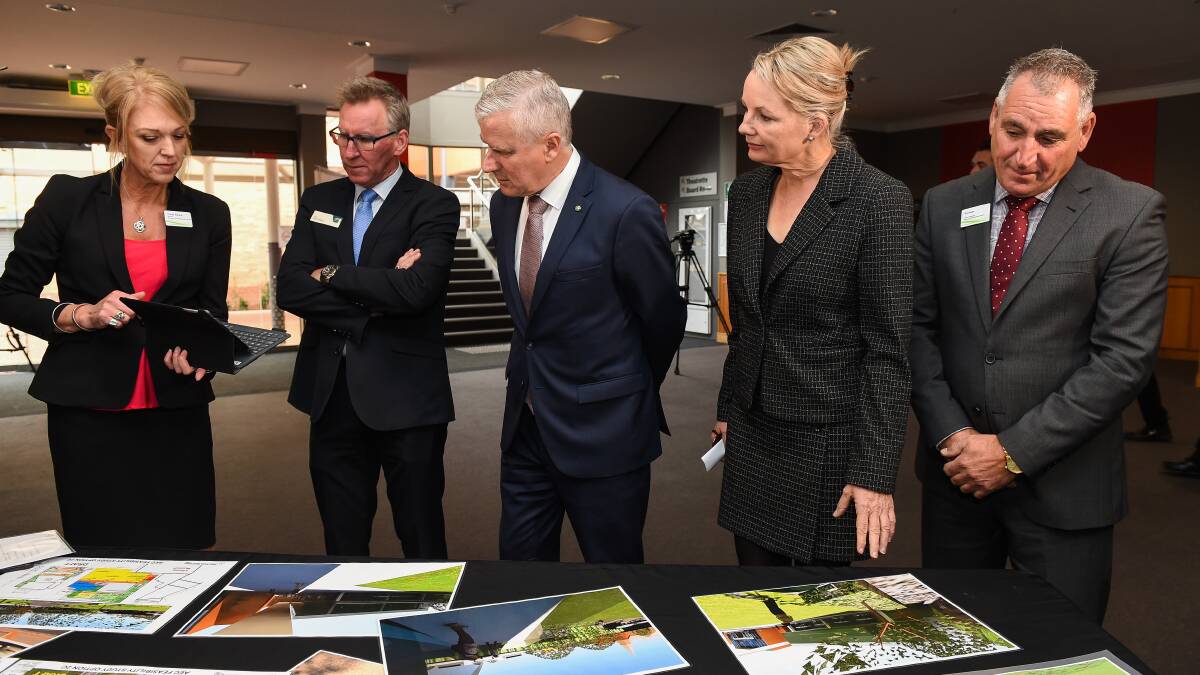 GRAND VISION: Albury Council acting general manager Tracey Squire, mayor Kevin Mack, Deputy PM Michael McCormack, Farrer MP Sussan Ley and AEC manager Brendan Maher. Picture: MARK JESSER