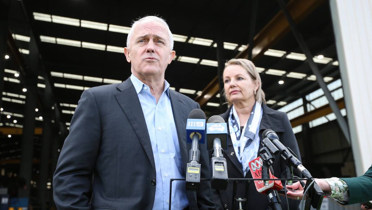 UNITED WE STAND: Prime Minister Malcolm Turnbull and Farrer MP Sussan Ley at Overall Forge on Wednesday tackling high gas prices. Picture: JAMES WILTSHIRE