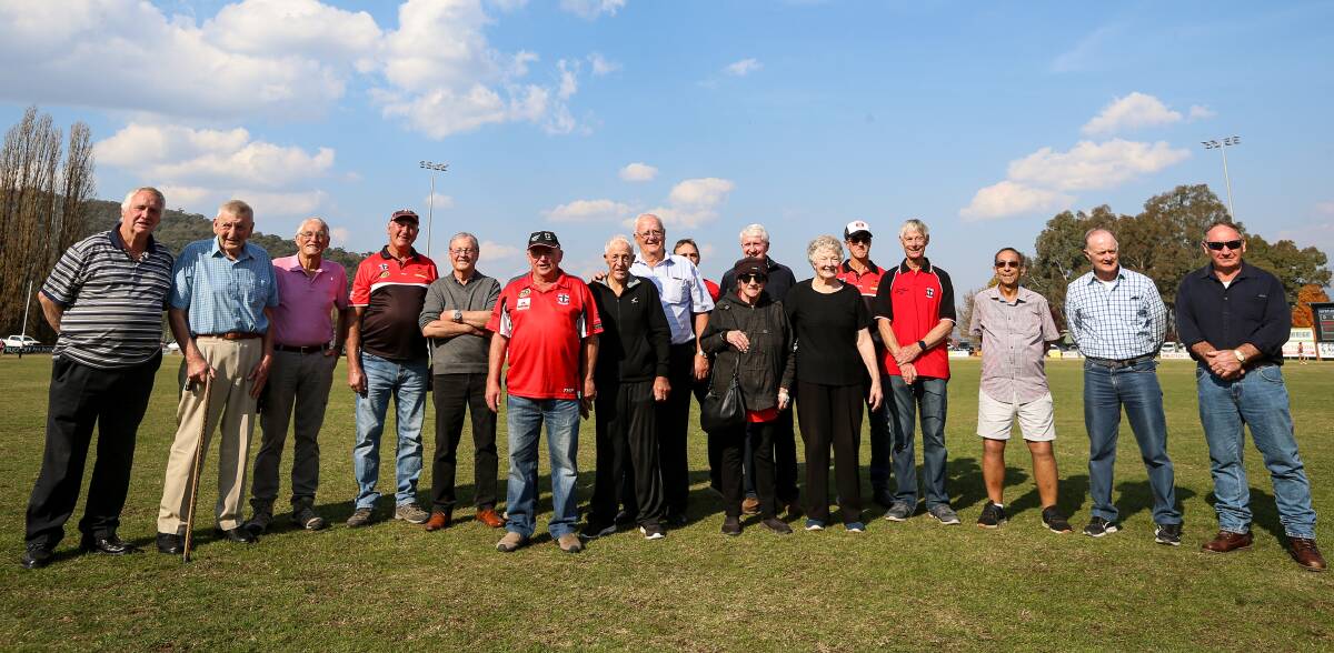 SAINTS ROYALTY: Members of the Myrtleford 1970 flag winning team gather before the start of Saturday's game at McNamara Reserve as part of long awaited reunion. Pictures: JAMES WILTSHIRE