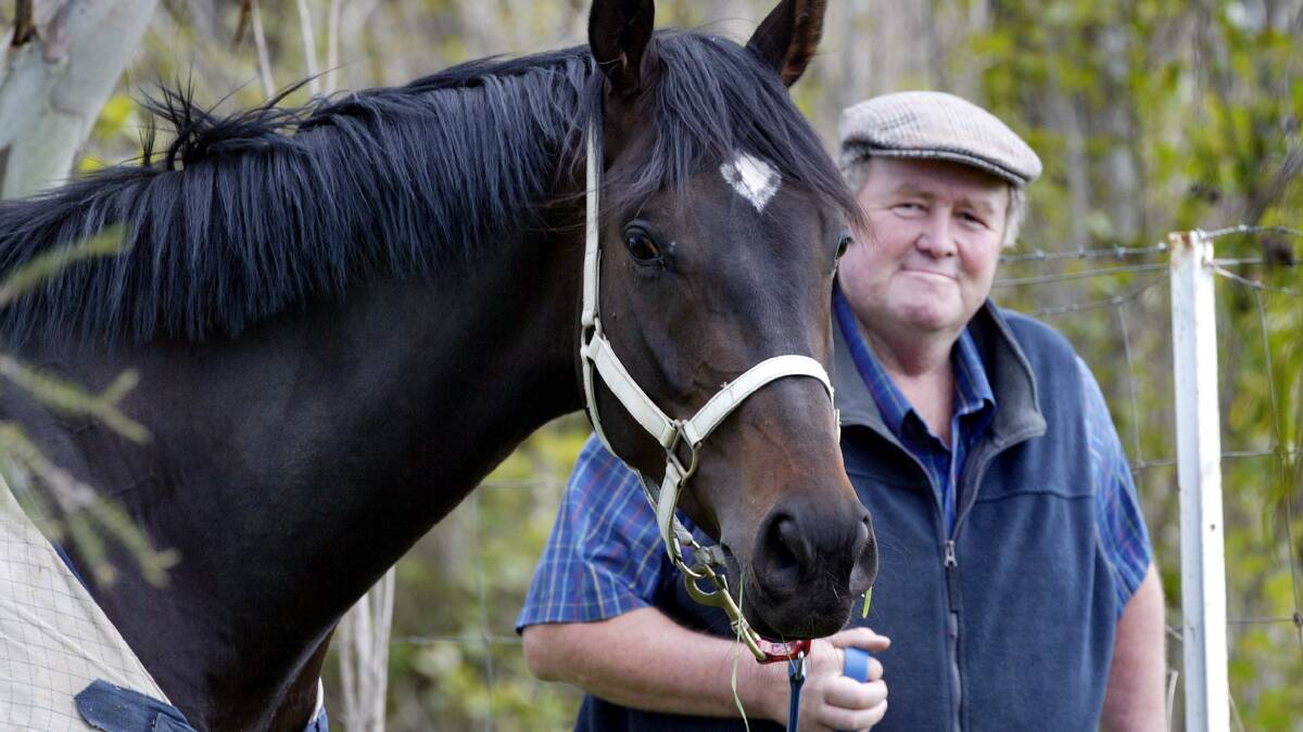MAGICAL MOMENT: Corowa trainer Richard Freyer and his 2005 Melbourne Cup fourth place-getter, Leica Falcon. A third generation trainer, Freyer died early on Monday.