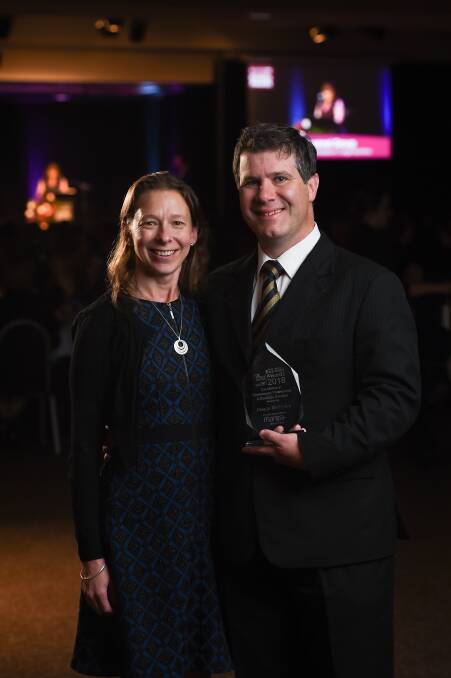 Justin and Tabitha Clancy with an award they won at this year's Albury-Wodonga Business Awards. Picture: MARK JESSER
