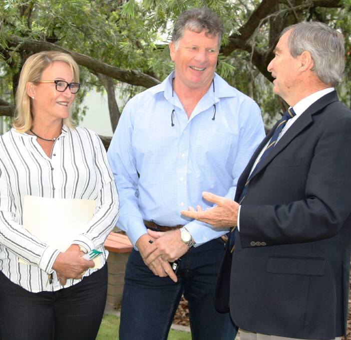MEANINGFUL TALKS: Murray Darling Basin Authority chairman Neil Andrew, right, chats with Murray River landowners, Ann McHardy and John Tyrrell about recent flooding in Albury on Monday.