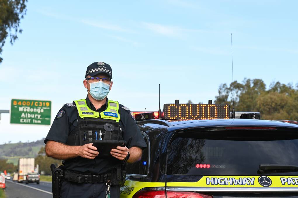LEAVE A YOUR PERIL: Senior Constable Owen Clarke from Wodonga Highway Patrol is part of the strengthened push to keep Melburnians out of regional Victoria. Picture: MARK JESSER