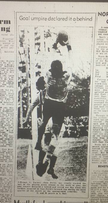Graham Farmer marks over Ovens and Murray opponent Alan Bell at the Albury Sportsground in 1954. East Perth 13.13 (91) defeated the O and M 8.9 (57).
