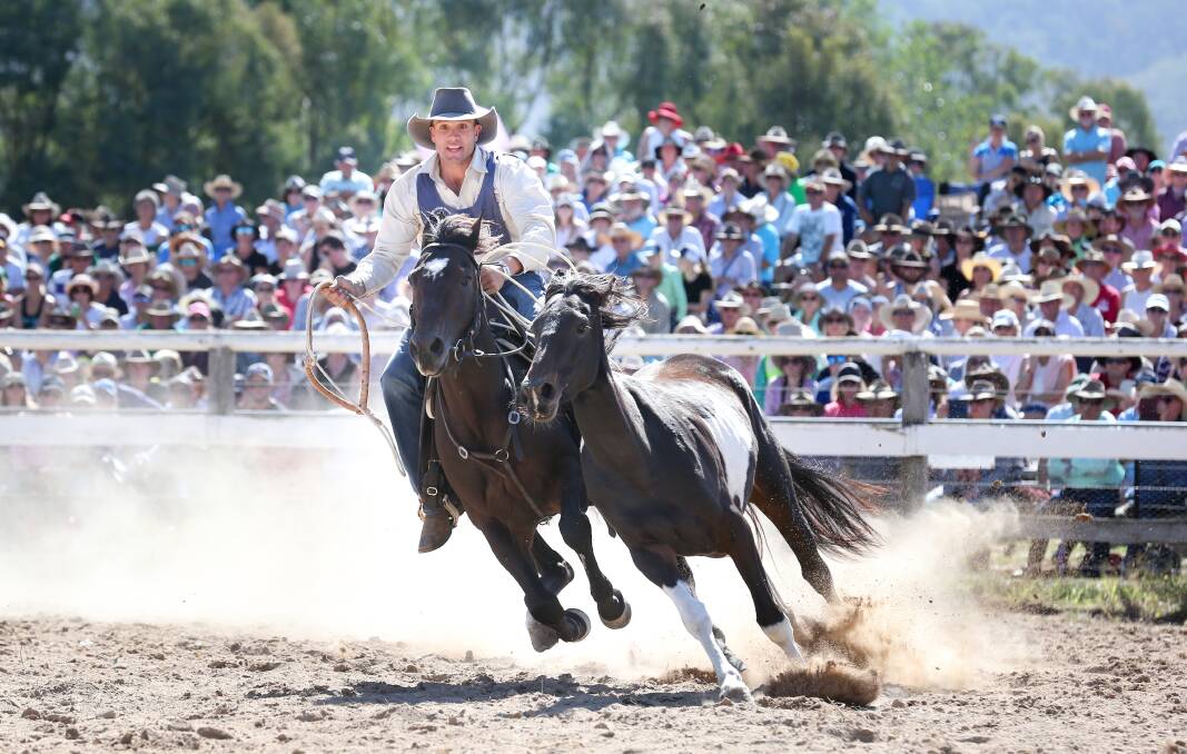 Kieran Davidson prepares to make a successful brumby catch in the Man From Snowy River Bush Festival challenge final at Corryong on Sunday. Picture: KYLIE ESLER