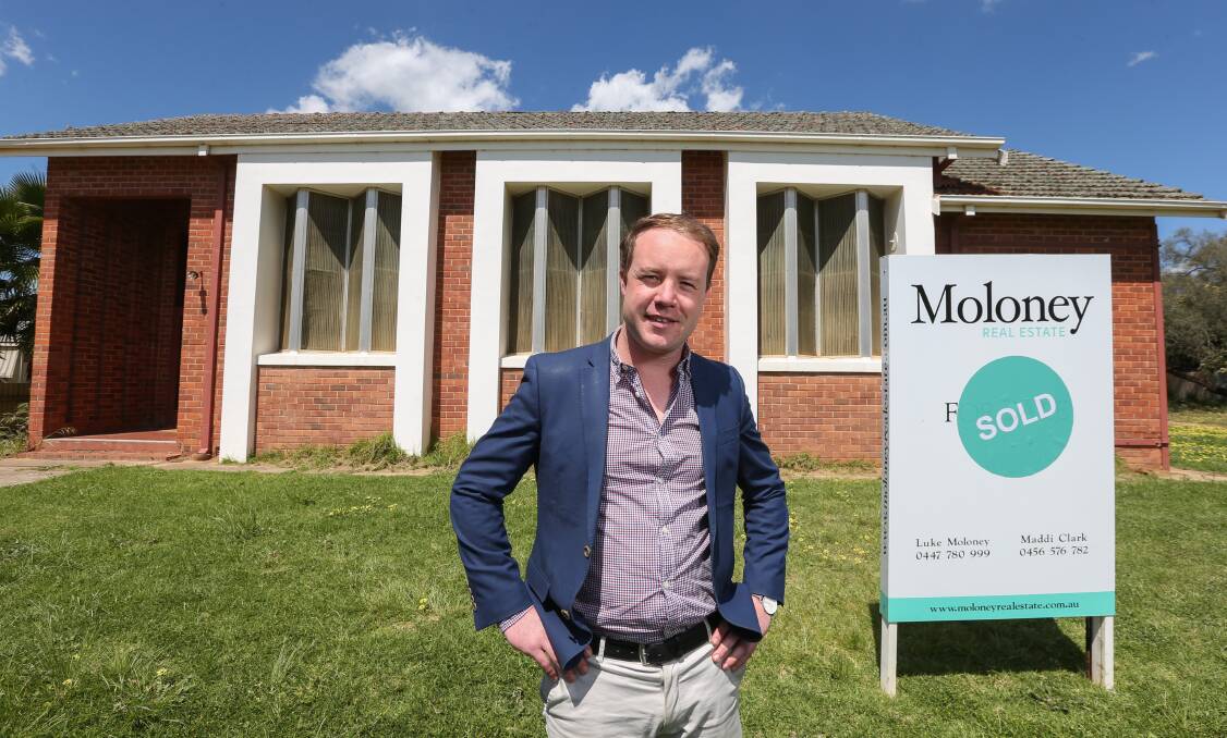 Luke Moloney from Moloney Real Estate at the Balldale Presbyterian Church which sold at auction on Saturday. Picture: TARA TREWHELLA