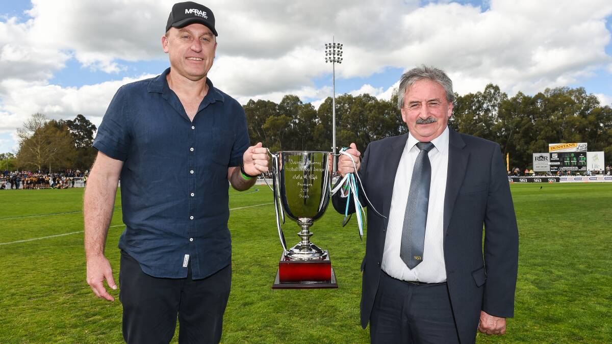 SS&A Club president Eddie Dunlop and Sydney Swans coach John Longmire at this year's Ovens and Murray league grand final.