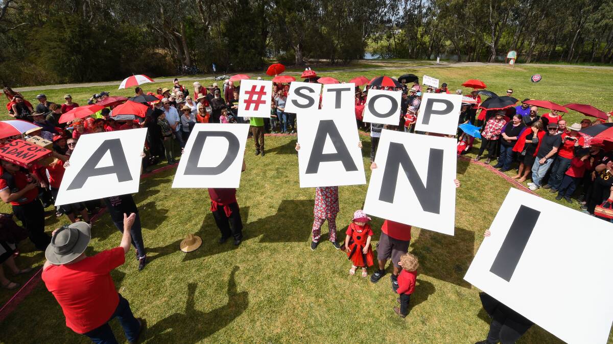LOUD AND CLEAR: Stop Adani protesters were out in force on the Lincoln Causeway on Saturday. More than 400 people showed their opposition to the coal mine plan. Picture: MARK JESSER