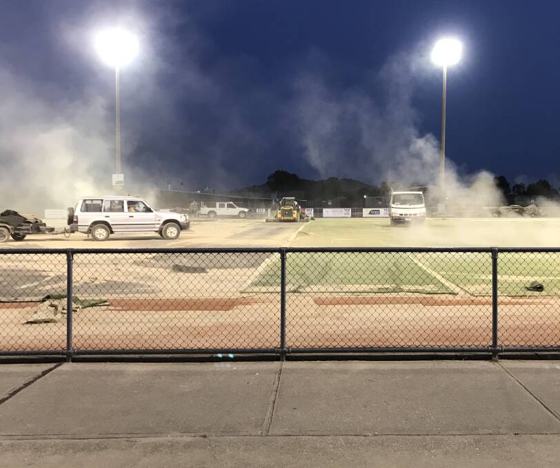 WORKING OVERTIME: Volunteers and businesses have been hard at work ripping up the old playing surface at Wodonga hockey fields.