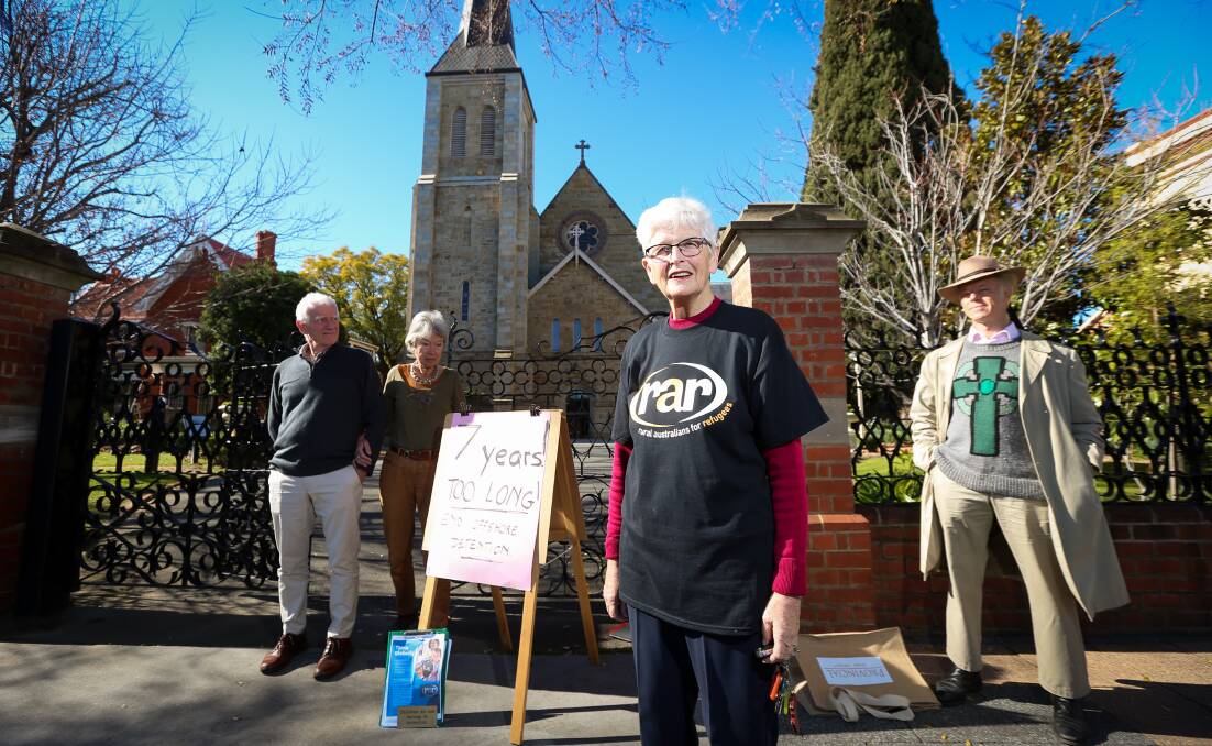 UNITED STAND: Rural Australians for Refugees Albury chapter leader Penny Vine was joined by Rob and Dotti Simmons and Father Peter MacLeod-Miller. Picture: JAMES WILTSHIRE
