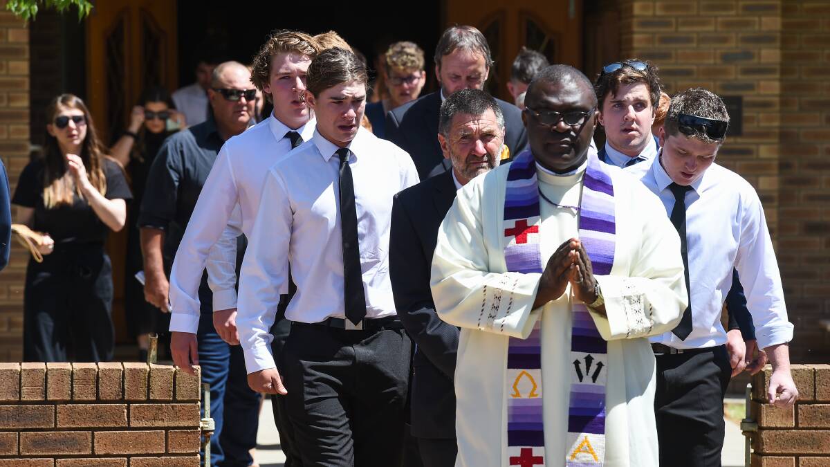 LAST RESPECTS: Father Henry Ibe led the funeral for Jeremy Martin-Heath at St Fiacres Catholic Church.