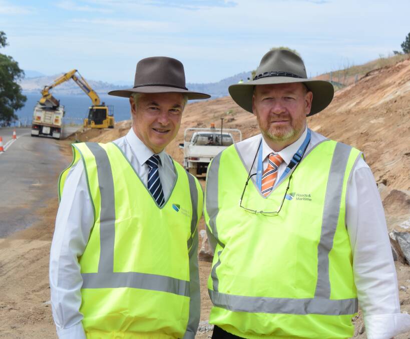 MAKING PROGRESS: Member for Albury Greg Aplin, left, and RMS regional maintenance delivery manager Mitch Judd on site at the Riverina Highway upgrade between Lake Hume Village and Bethanga Bridge.