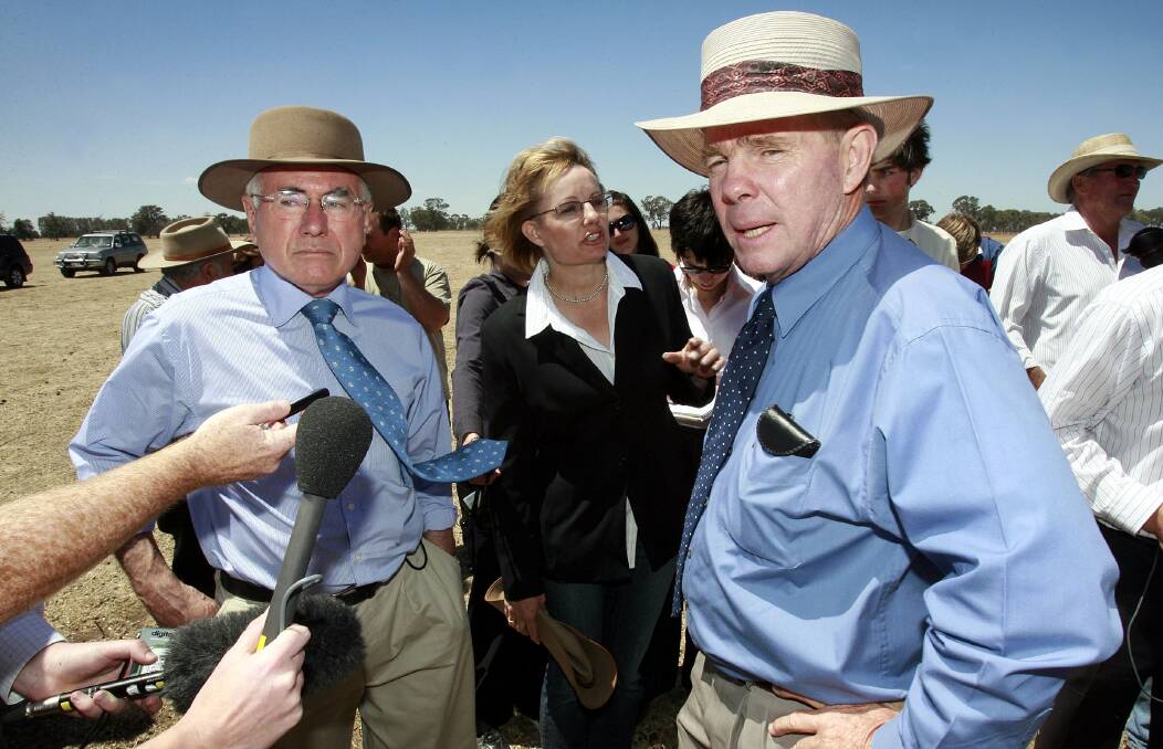 Former Prime Minister John Howard, left, visits the Riverina during the millenium drought with Sussan Ley and Berrigan Shire mayor John Bruce.