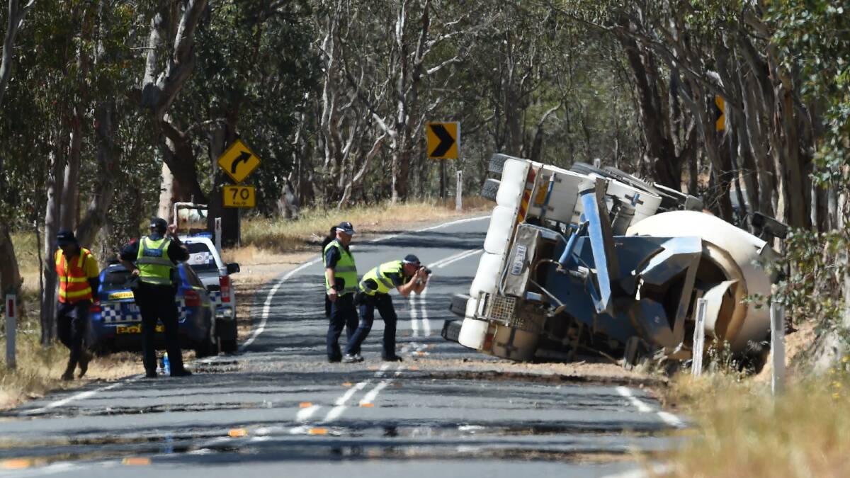 CRASH SCENE: Police investigate the circumstances surrounding an accident at Talgarno which claimed the life of Wodonga trainer Brian Cox. Picture: MARK JESSER