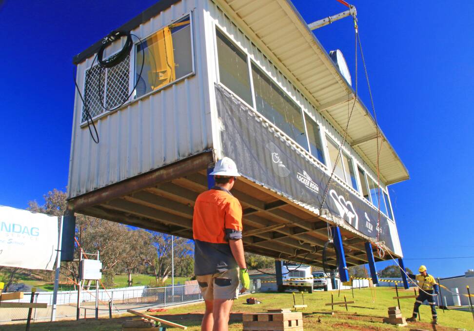 RELOCATION: The Lavington Sportsground coaches boxes have been moved to the hill area as contractors Hansen Yuncken start on major works. PHOTOS COURTESY ALBURY COUNCIL