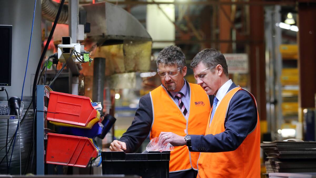NSW Premier Gladys Berijiklian's predecessor, Mike Baird, visited the Albury Seeley factory in 2014 when the company was searching for a new site to expand.