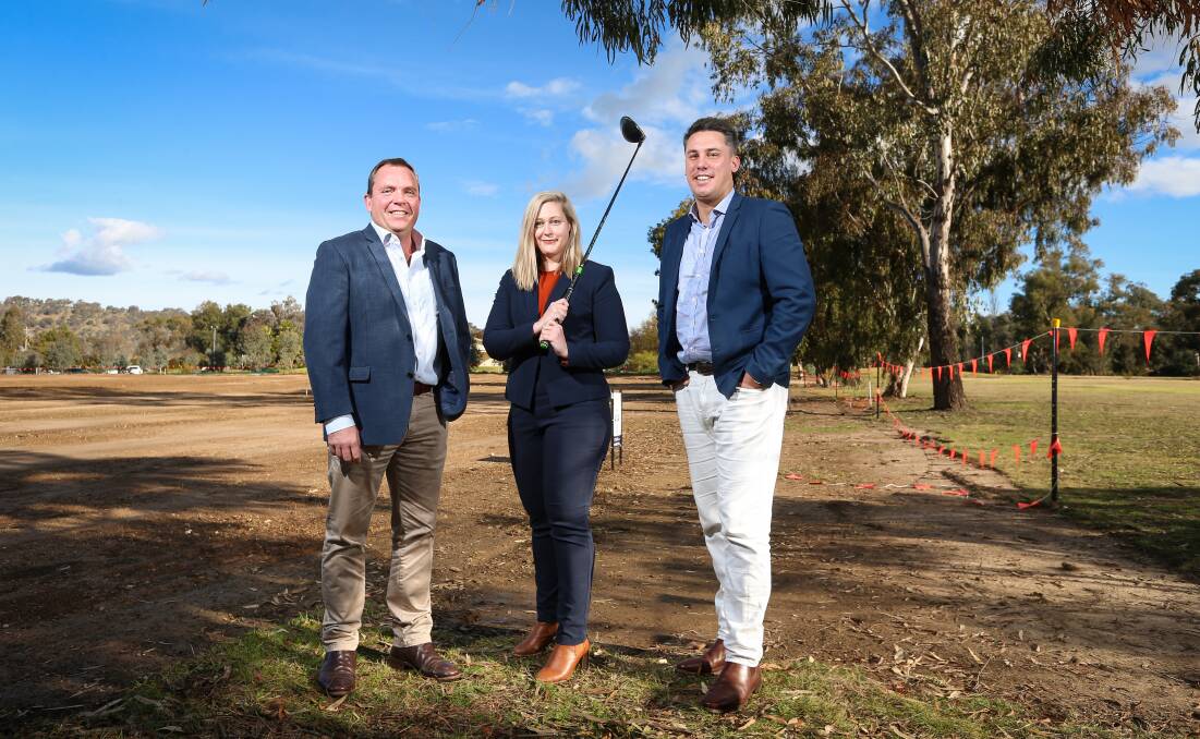 BIG HIT: PJ Murphy's Mark Boehm, Kate Norton-Smith and Leon Kowski at Wodonga golf course where five blocks will be auctioned. Picture: JAMES WILTSHIRE