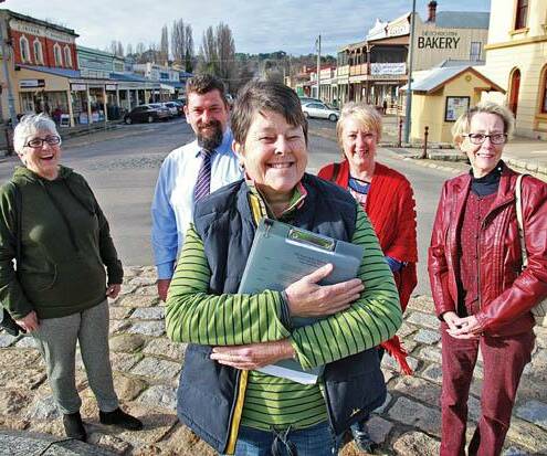 HELPFUL HISTORY: Judge Robbie Rae with James Trenery and Beechworth Tidy Towns committee members Iris Mannik, Anne Wilson and Jill Jarvis-Wills. Picture: INDIGO SHIRE