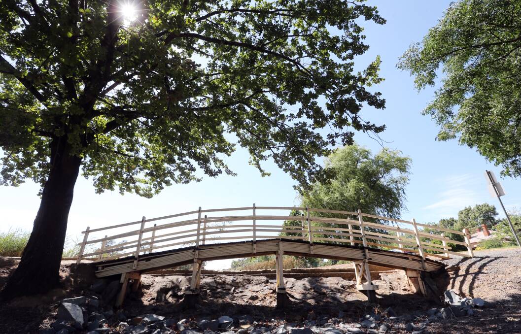 OUT WITH THE OLD: The 140-year-old bridge by Lake Anderson has been removed and will make way for a new one to be finished in June.