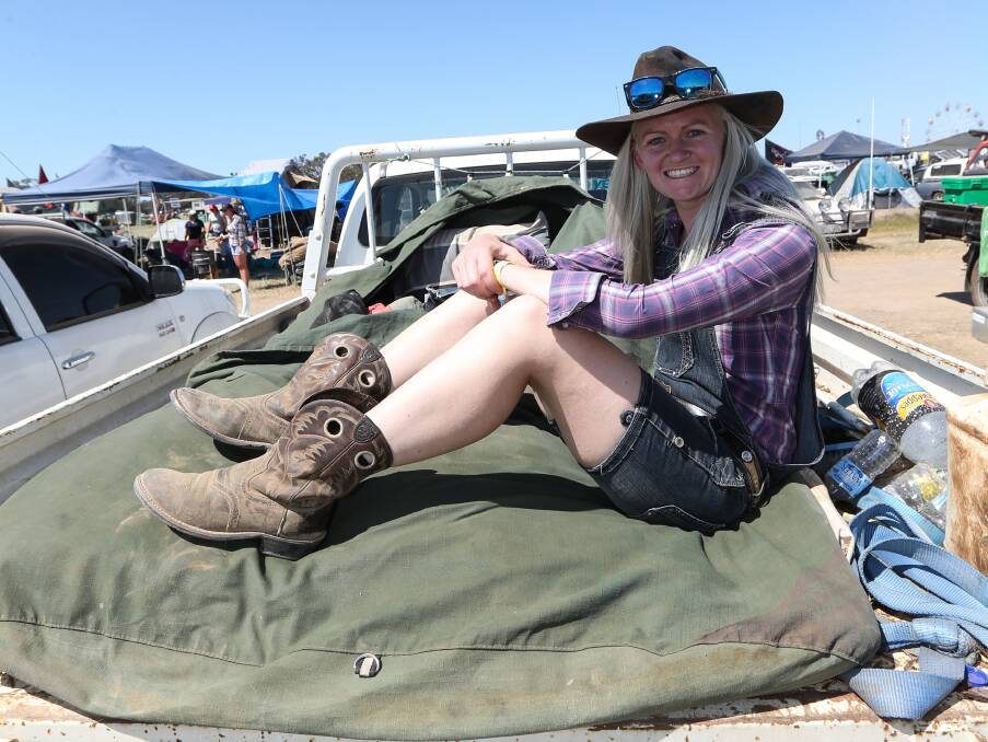 CAMPING OUT: Allison Thrumble from Berrigan dug out her overalls and set up her swag in the ute tray, ready to take on another muster.