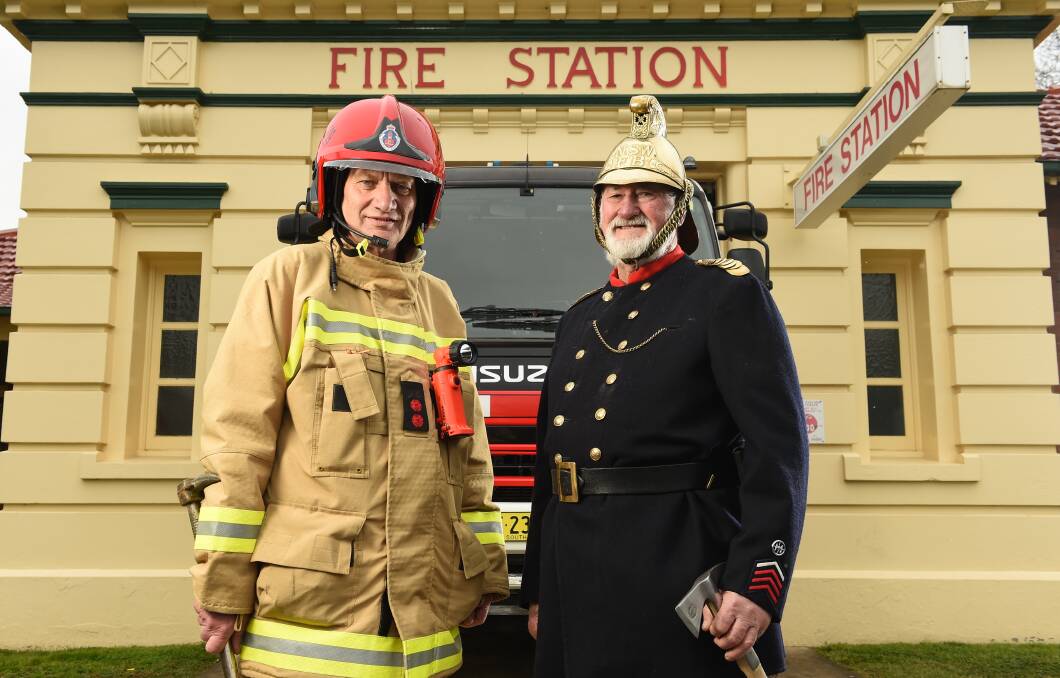 HISTORIC BUILDING: John Vandeven and Harold Byrnes stand outside the Albury Civic Fire Station, built on Kiewa Street 100 years ago. Picture: MARK JESSER