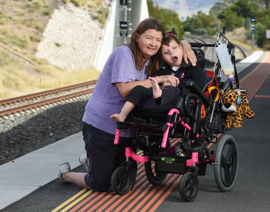 BUMPY TRIP: Shirley McKernan with her daughter Matilda Maxwell, who was tipped out of her wheelchair on a train trip. Picture: MARK JESSER