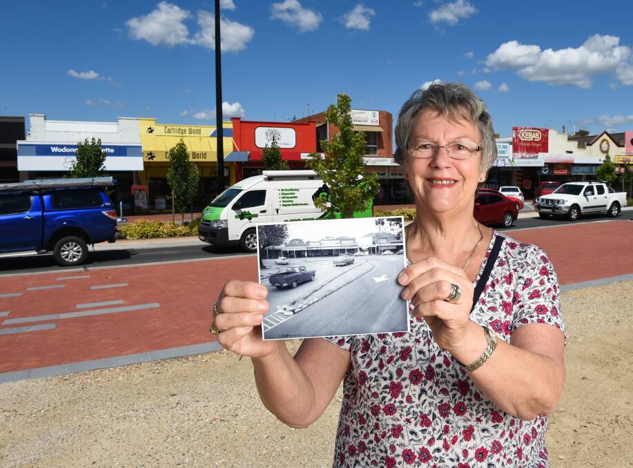 CHANGE: Uta Wiltshire holds one of her favourite photos which will be used for a book on the history of the Old Hume Highway. Picture: MARK JESSER
