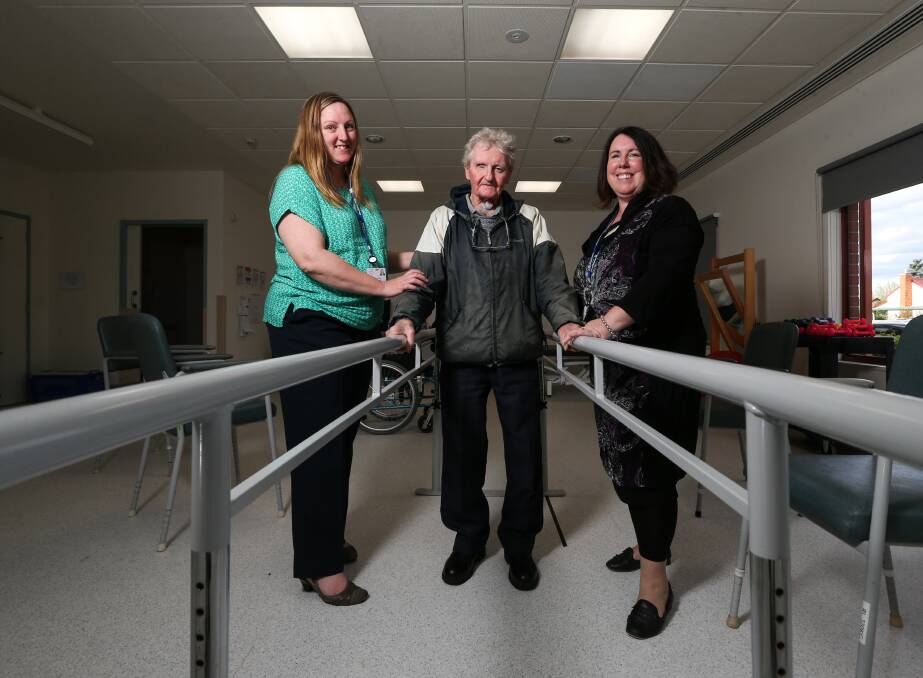 MAKING STRIDES: Project Manager Louise Coote, patient George Brown and Dr Lucie Shanahan in the new rehabilitation ward at Albury Wodonga Health Wodonga campus. Picture: JAMES WILTSHIRE