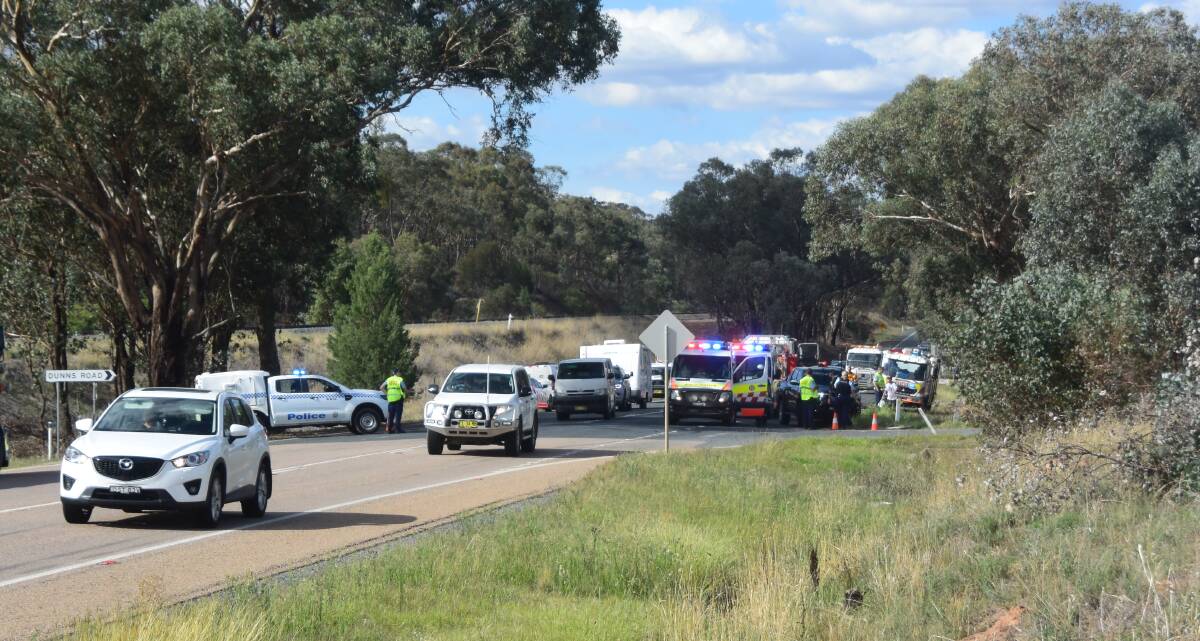 CRASH: Emergency services respond to a two-car collision that injured six people on the Olympic Highway near Dunns Road on Friday afternoon. Picture: Rex Martinich