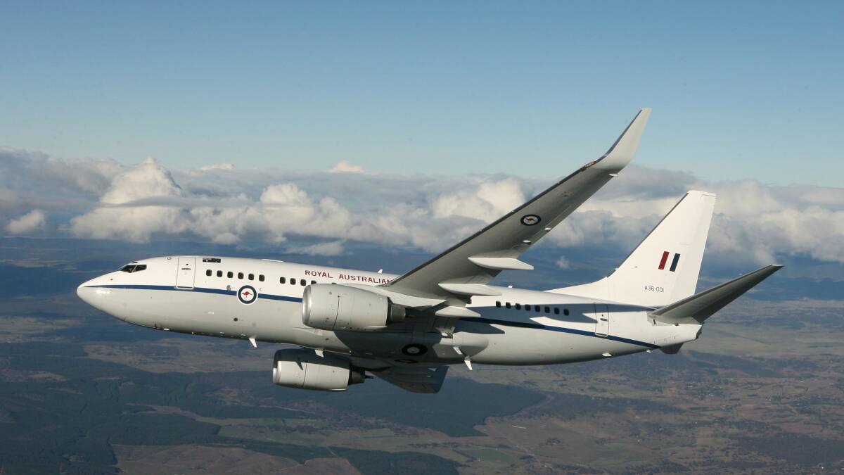 A36-001 Boeing 737 BBJ over Canberra. Photo: Department of Defence