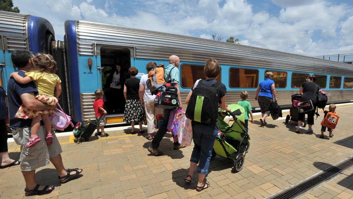 Passengers board the The XPT rail service at Wagga station. The Sydney to Melbourne service will not be able to guarantee services during the current bushfire emergency. 
