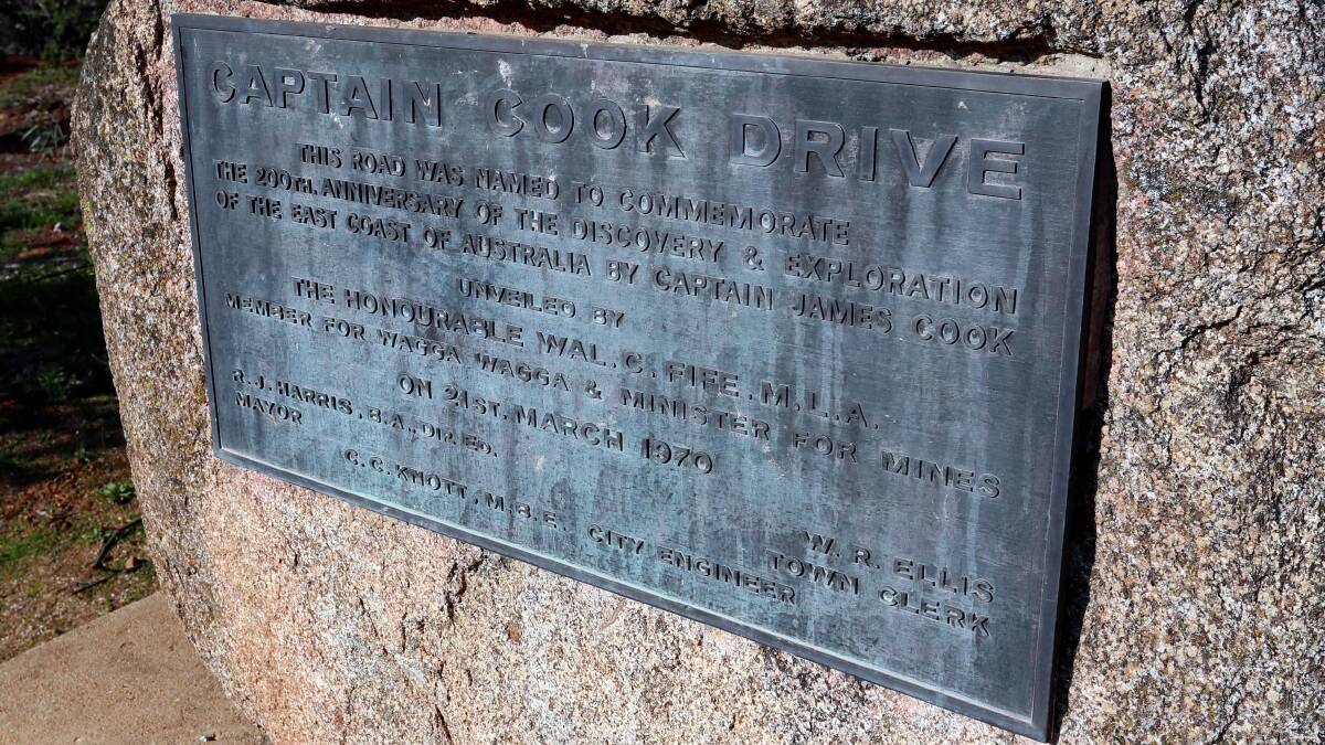 DIVISION: The Captain Cook Drive plaque on Willans Hill.