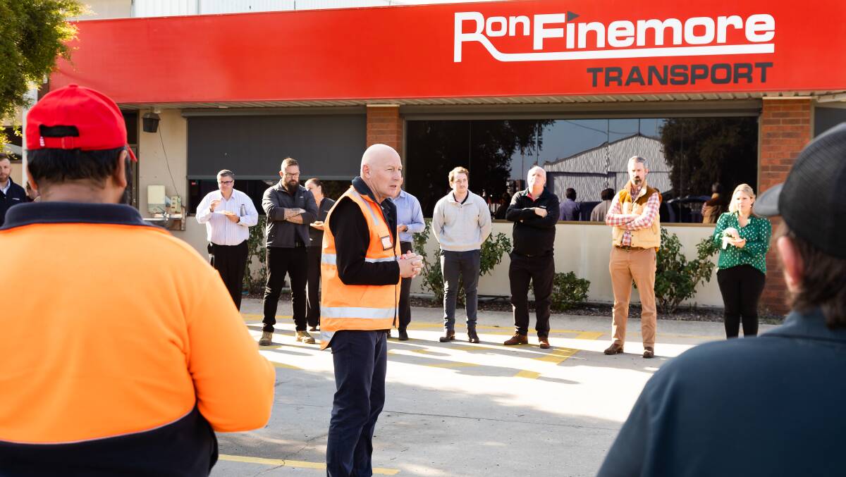 Ron Finemore Transport managing director Mark Parry speaking to staff on RUOK Day.