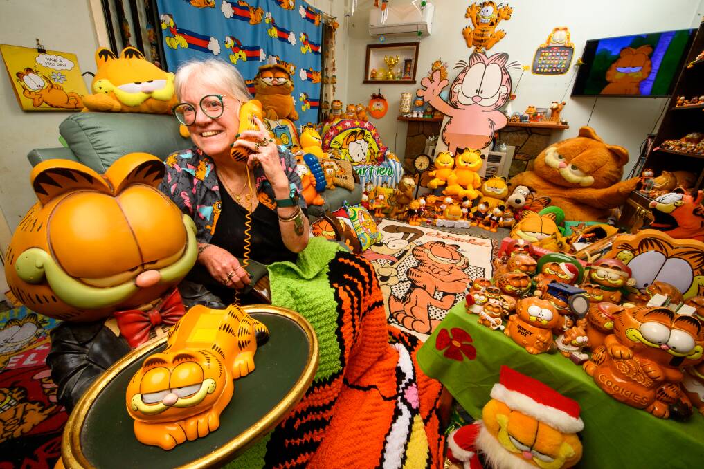 Garfield-mad Lorraine Boyd amid her collection of 'thousands and thousands' of Garfield collectable items. Picture by Mark Jesser