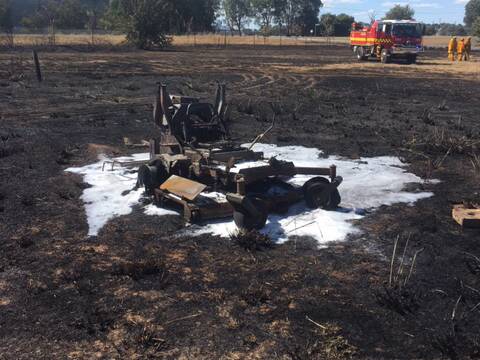 Firefighters control a fire started by a lawn mower. Picture: CFA (Supplied)