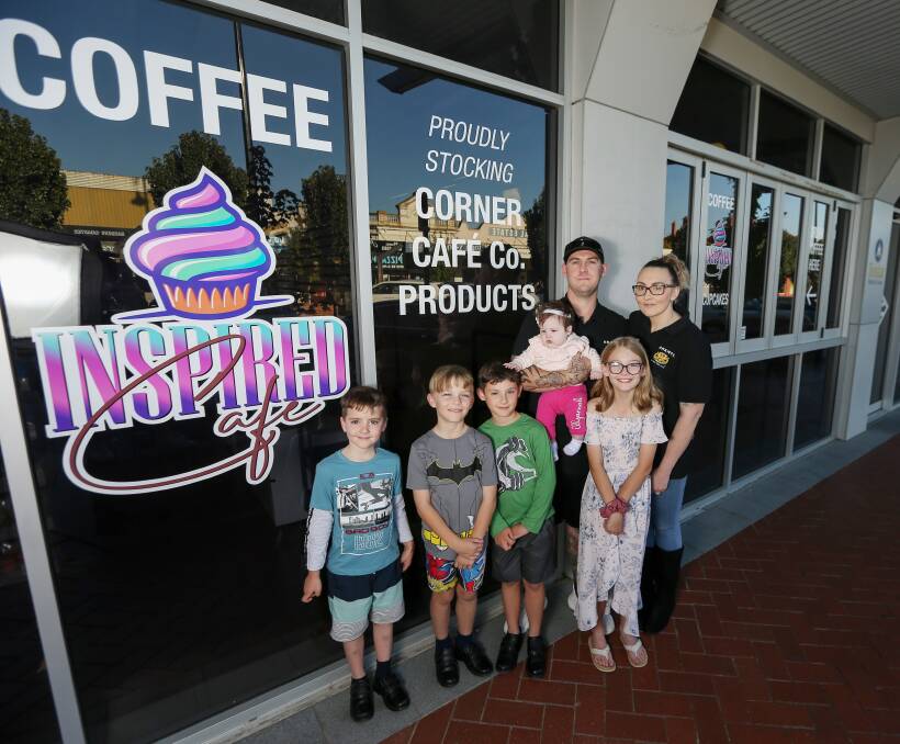 FAMILY TIES: Wodonga couple Spencer and Nikkie Burns with five of their six children from left: Jyden, 6, Blake, 9, Chaise, 8, Ellyarnah, 4 months, and Alana, 10, ahead of the official opening of Inspired Cafe. Picture: TARA TREWHELLA