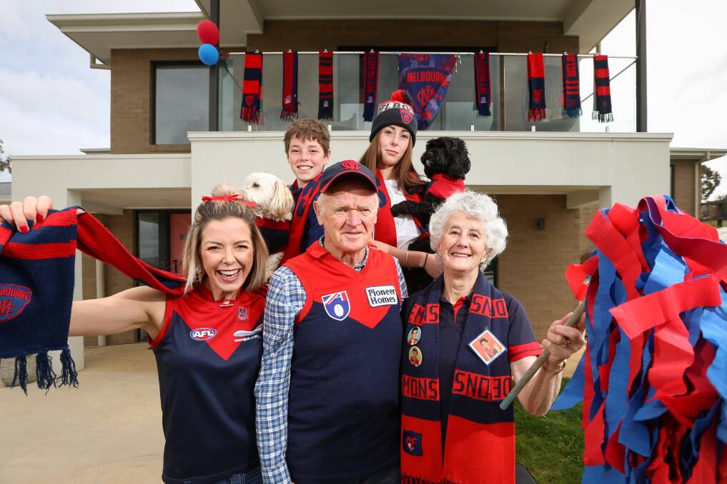 DIEHARDS: Melbourne tragics Bronwyn Tyrell, John and Joy Jacob, Ayden, 12, and Ella Tyrell, 14, with Jax and Millie. Picture: JAMES WILTSHIRE