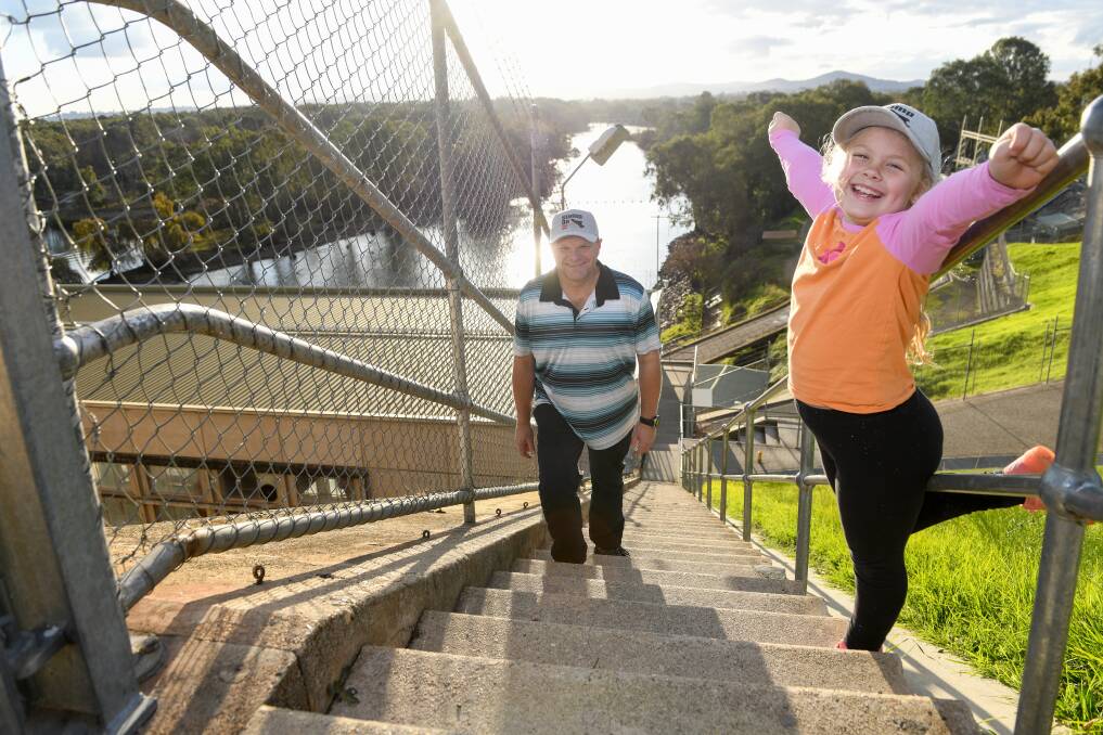 Albury's Terry Hubbard, walking the stairs at the weir wall ahead of the Stadium Stomp at the MCG on Sunday, June 4. His granddaughter Olivia Teneye, 7, has been cheering him on as he trains for the 7300 stairs that await him inside Australia's biggest stadium. Picture by Tara Trewhella

