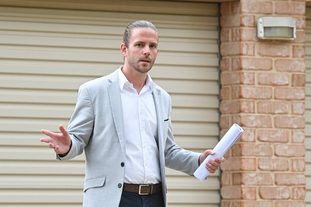 STRONG RESULTS: Stean Nicholls Real Estate sold two homes at auctions in Albury on Saturday, much to the delight of agent Nicholas Clark.