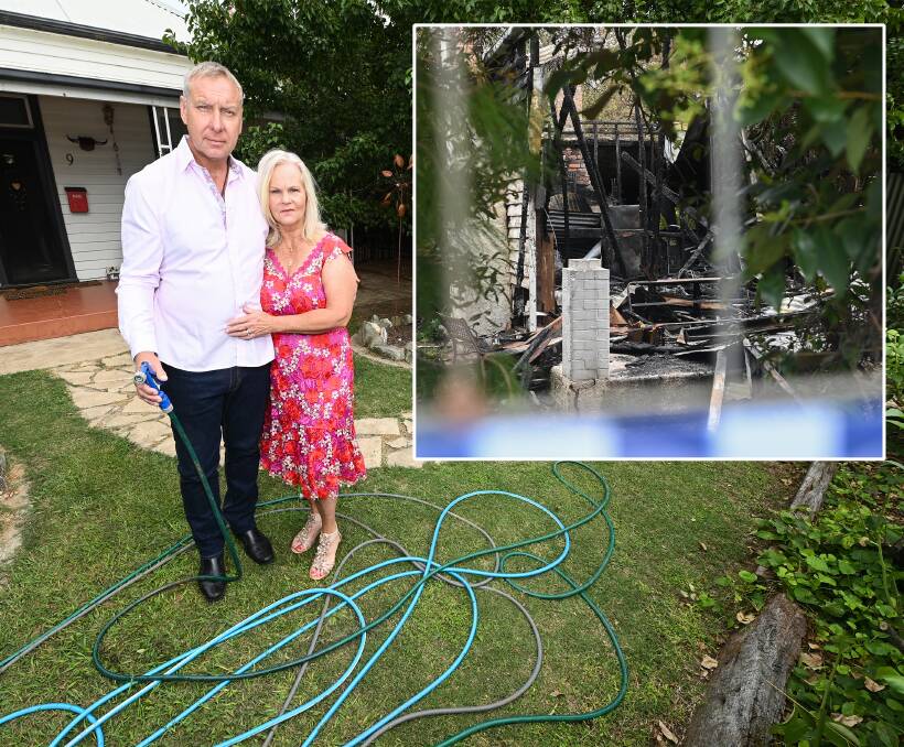 HELPING HAND: Rutherglen's Paul and Sabine Winkler rushed across to neighbour Bev Sandford's house on Fortune Street with hoses after it caught alight on Friday afternoon. Pictures: MARK JESSER