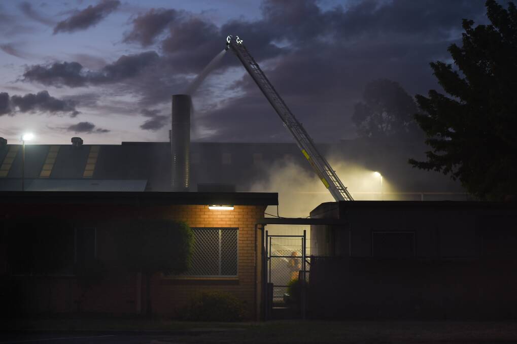 Fire crews tackle a blaze at Bradken Wodonga on Friday night. Pictures: MARK JESSER