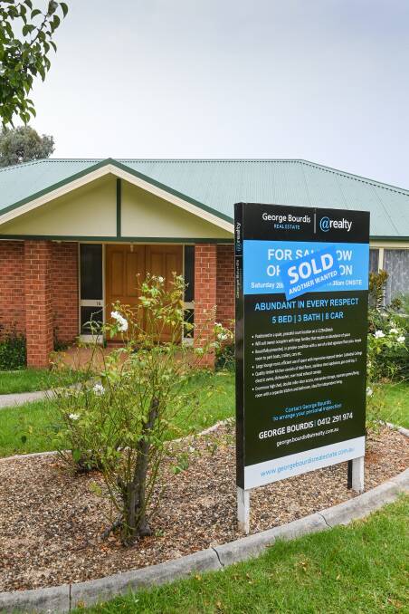 SNAPPED UP: 16 McDiarmid Place, Glenroy was due to be auctioned by George Bourdis Real Estate on Saturday but was sold beforehand. Pictures: MARK JESSER