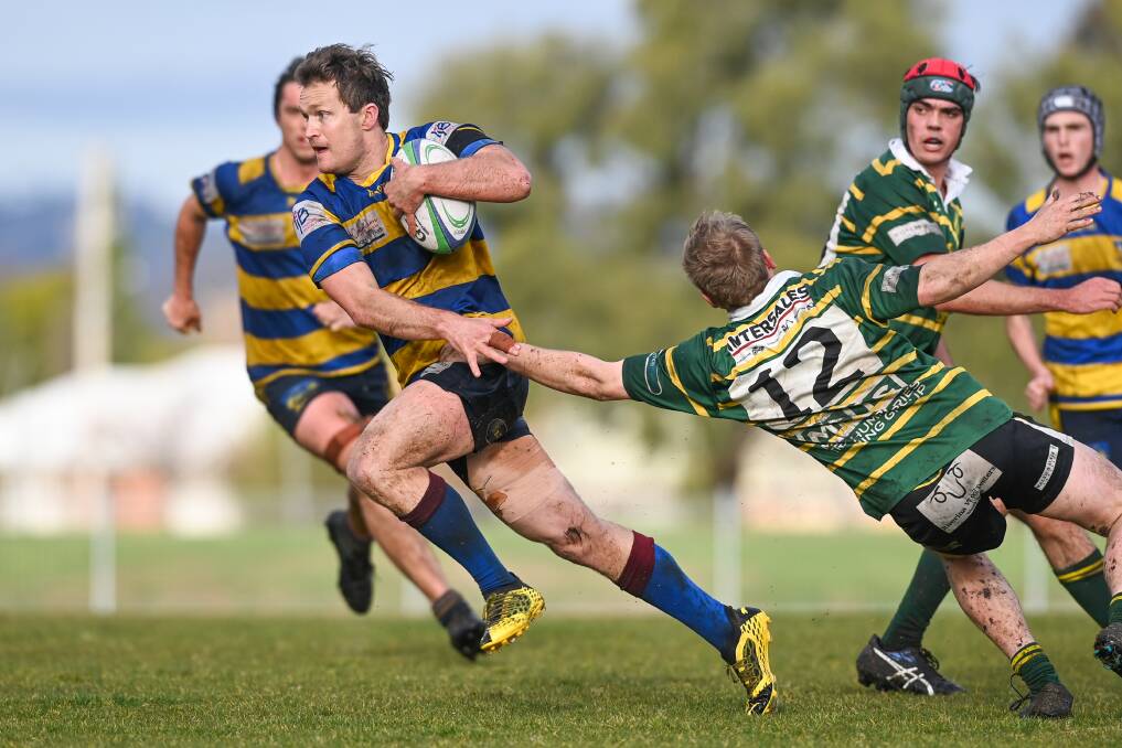 HANDS OFF: Blake Le Cornu escapes the clutches of Fynn Walker during the Steamers' win over Wagga Ag College. Picture: MARK JESSER