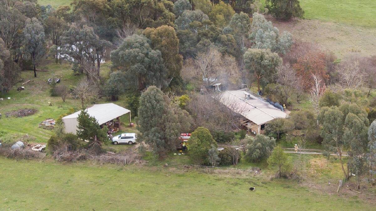 DAMAGED: Emergency services respond to a structure fire on at a Johnsons Lane property on Friday afternoon. Picture: MARK JESSER