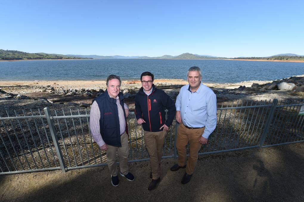 REVIEWS: Interim Inspector-General Mick Keelty at Lake Hume in September with Water Minister David Littleproud and MDBA River Management's Andrew Reynolds.